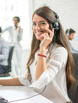 School administrator helping a parent with tuition billing software