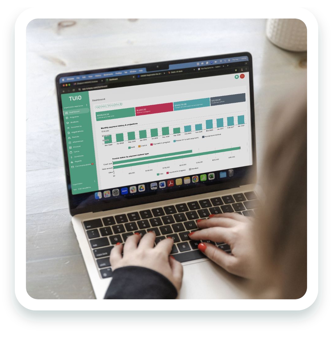 Hands using a laptop displaying the TUIO dashboard
