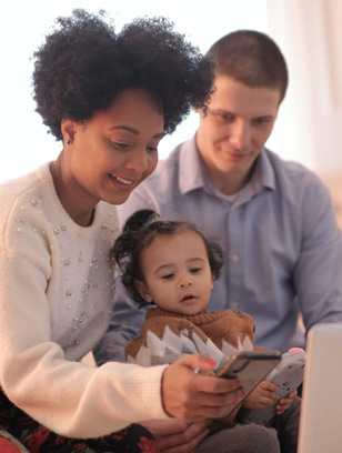 parents engage child after daycare