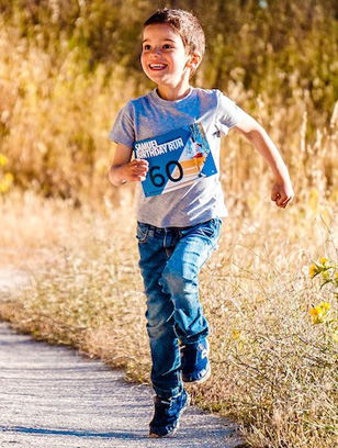 kid running at summer camp